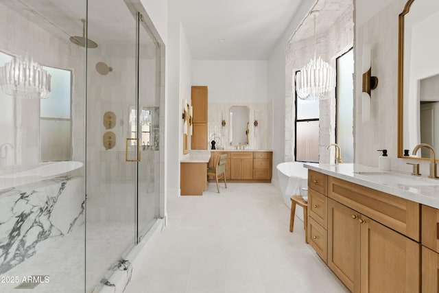 24645 N 117th St, Scottsdale, AZ 85255 - full bathroom featuring two vanities, a shower stall, a freestanding tub, tile patterned floors, and a chandelier