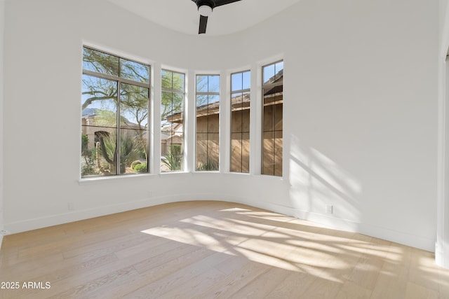 24645 N 117th St, Scottsdale, AZ 85255 - spare room featuring a ceiling fan, light wood-style flooring, and baseboards