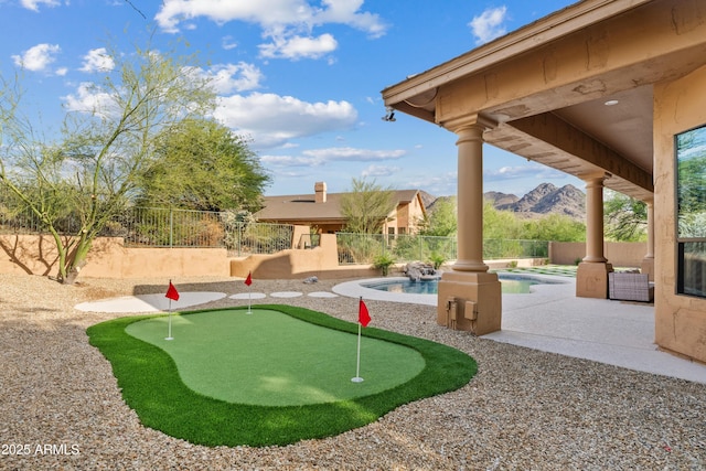 24645 N 117th St, Scottsdale, AZ 85255 - fenced backyard featuring a putting area, a patio, and a mountain view