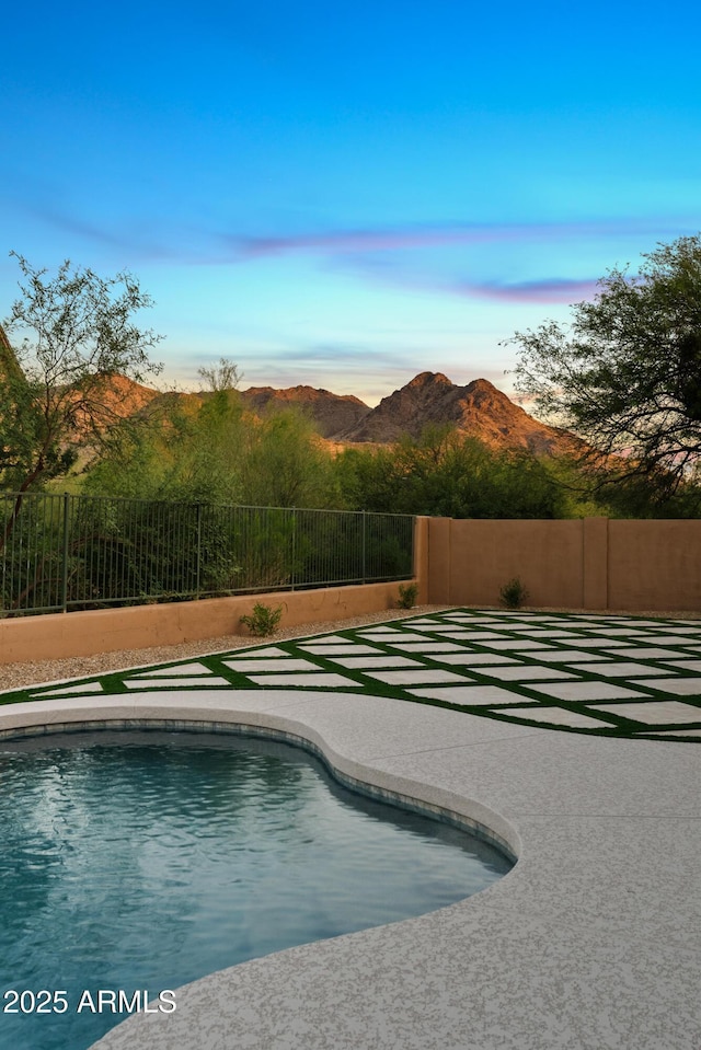 24645 N 117th St, Scottsdale, AZ 85255 - pool at dusk with a mountain view