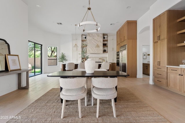 24645 N 117th St, Scottsdale, AZ 85255 - dining room with light wood-type flooring, recessed lighting, and a chandelier