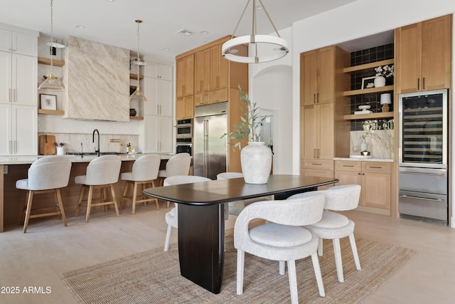 24645 N 117th St, Scottsdale, AZ 85255 - dining room with wine cooler and recessed lighting