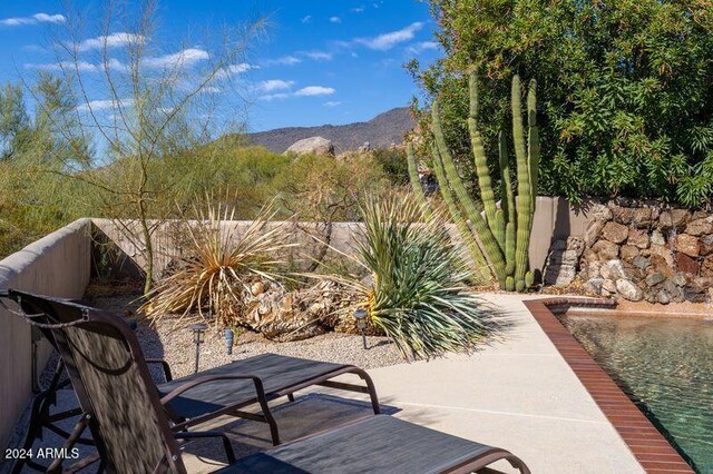 view of patio with a mountain view