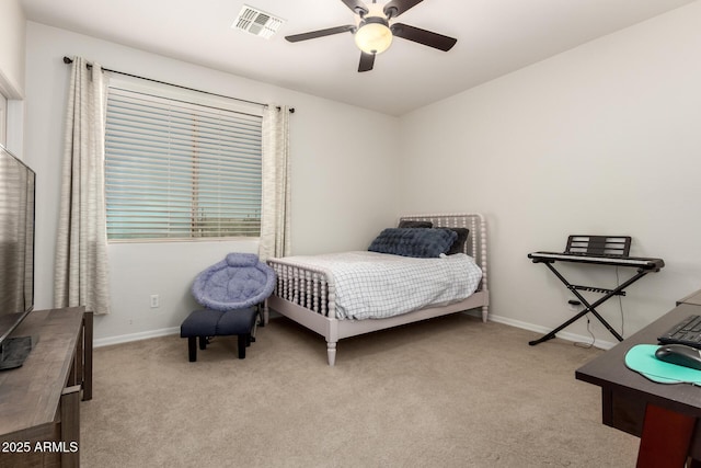bedroom featuring carpet, baseboards, and a ceiling fan