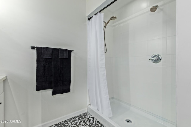 6628 N 2nd Ave, Phoenix, AZ 85013 - bathroom with a shower stall and baseboards