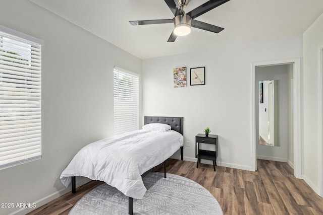 6628 N 2nd Ave, Phoenix, AZ 85013 - bedroom with wood finished floors, baseboards, and ceiling fan