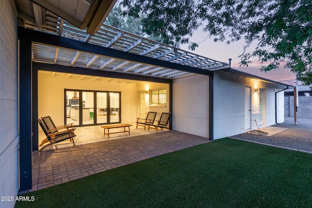 6628 N 2nd Ave, Phoenix, AZ 85013 - back of property featuring a pergola, a patio area, and brick siding