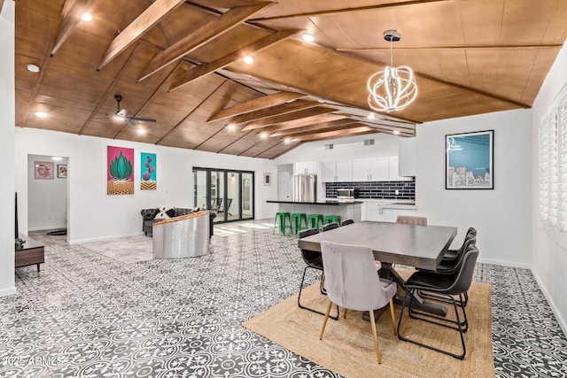 6628 N 2nd Ave, Phoenix, AZ 85013 - dining area with wood ceiling, a chandelier, and baseboards