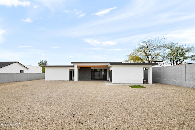 14025 N 11th Pl, Phoenix, AZ 85022 - rear view of property featuring a fenced backyard, stucco siding, and a patio