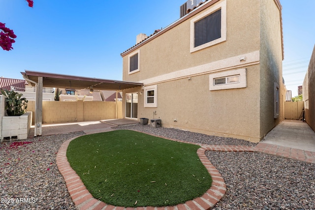 back of house featuring a patio area