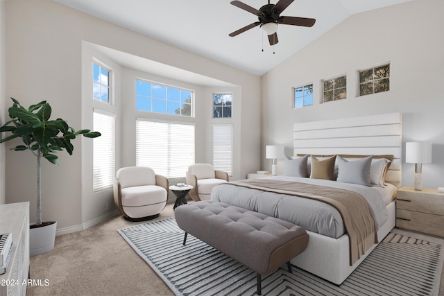 bedroom with high vaulted ceiling, light colored carpet, baseboards, and a ceiling fan