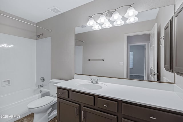 bathroom featuring toilet, vanity, visible vents, and shower / bathtub combination