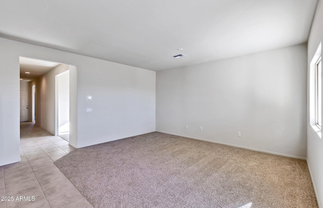 view of carpeted spare room