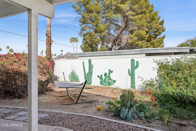 view of yard featuring fence