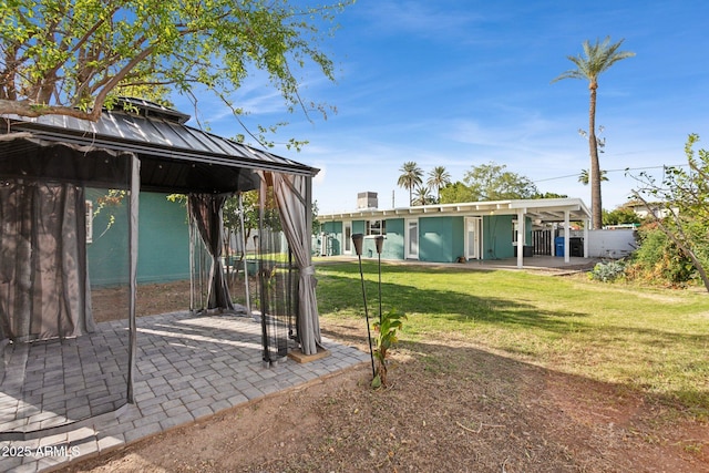 view of yard with a gazebo and a patio