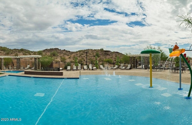 pool featuring a pergola