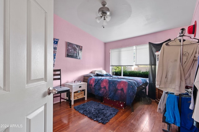 bedroom featuring dark wood-type flooring and ceiling fan