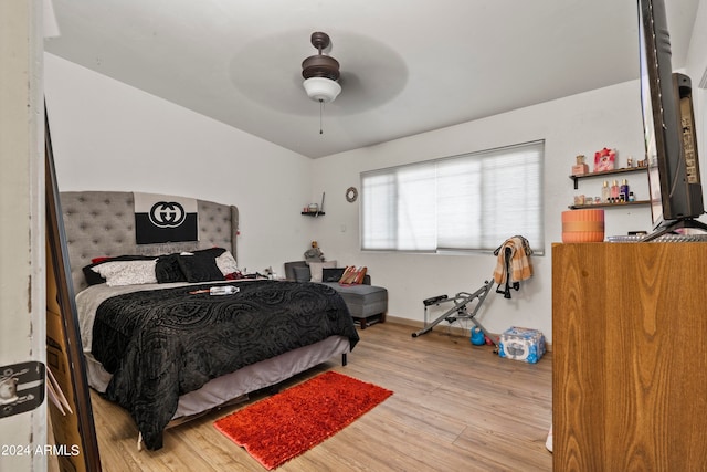 bedroom featuring ceiling fan and light hardwood / wood-style floors