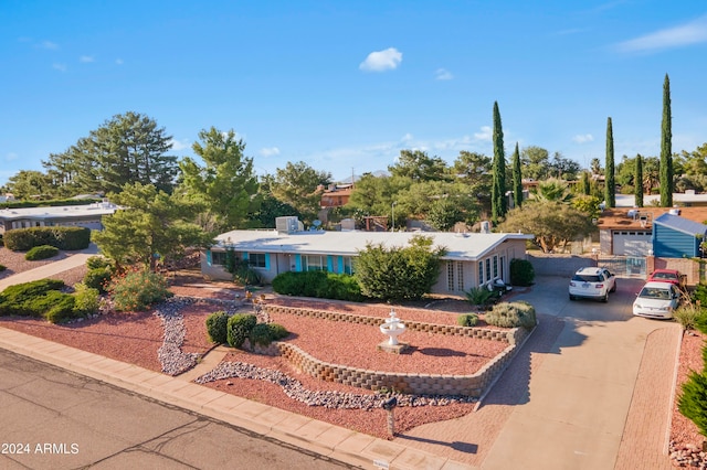 single story home with a garage