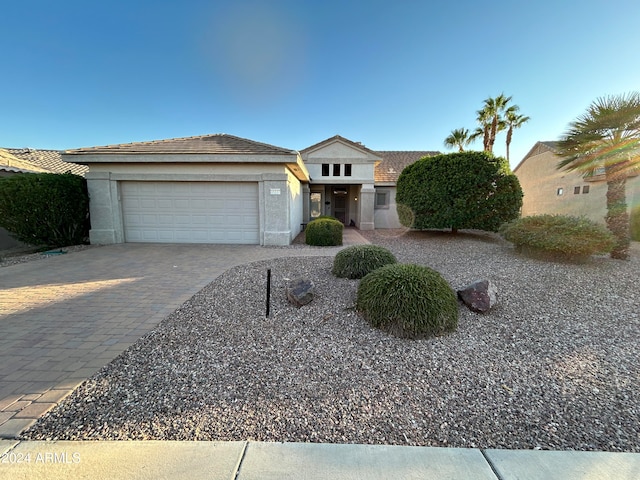 view of front of property featuring a garage