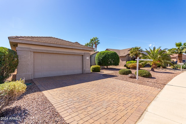 view of front of property featuring a garage