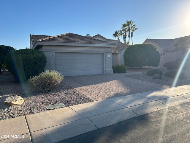 view of front of property with a garage