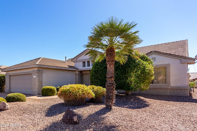 view of front of home with a garage