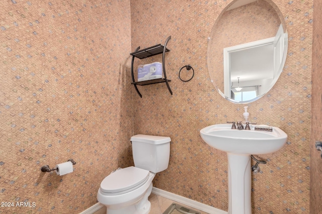 bathroom featuring toilet