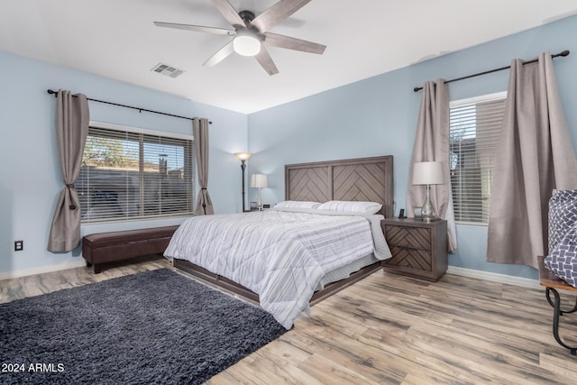 bedroom featuring ceiling fan and light hardwood / wood-style floors