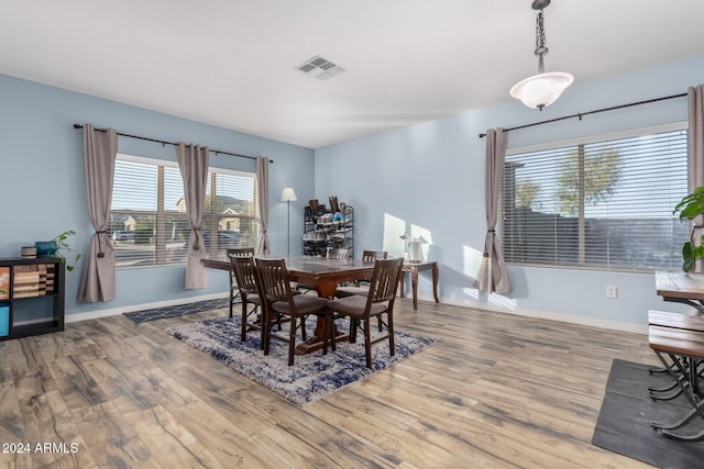 dining room with hardwood / wood-style flooring