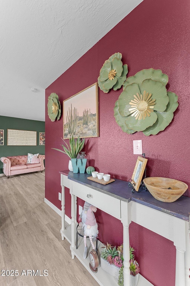 6289 E Duchess Dr, Prescott Valley, AZ 86314 - detailed view of wood finished floors, a textured ceiling, and baseboards