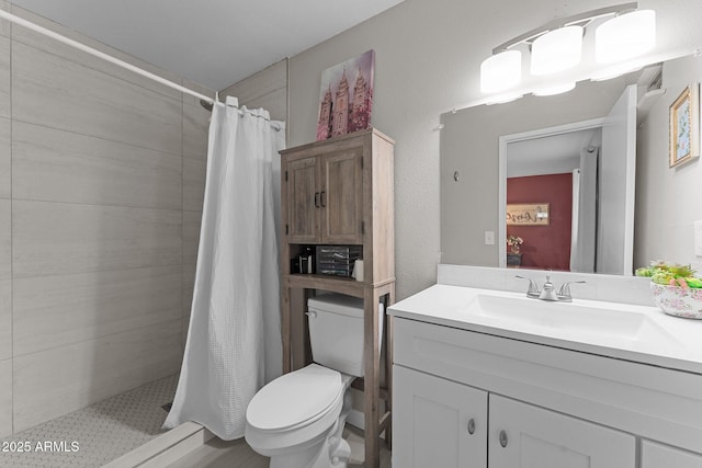 6289 E Duchess Dr, Prescott Valley, AZ 86314 - full bathroom featuring toilet, vanity, and a stall shower