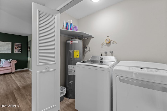 6289 E Duchess Dr, Prescott Valley, AZ 86314 - laundry area with water heater, washer and dryer, and wood finished floors