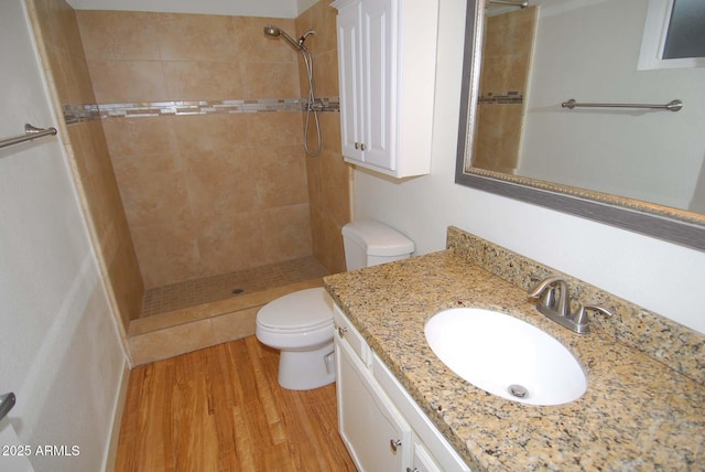 2015 E Southern Ave Unit 23, Tempe, AZ 85282 - bathroom featuring wood finished floors, a tile shower, and vanity