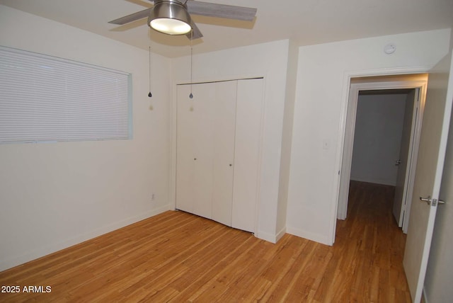 2015 E Southern Ave Unit 23, Tempe, AZ 85282 - unfurnished bedroom with light wood-type flooring, a closet, and ceiling fan