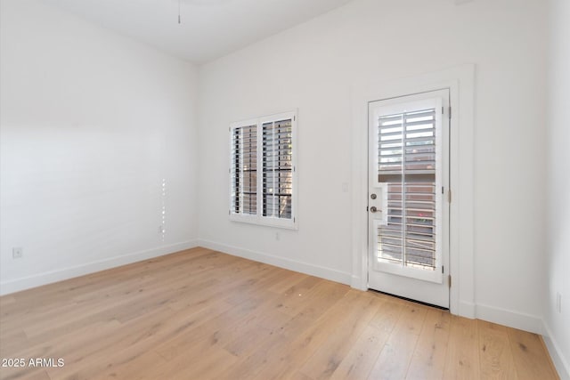 unfurnished room featuring light hardwood / wood-style floors