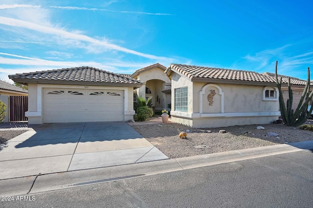 view of front of property with a garage