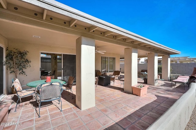 view of patio with ceiling fan