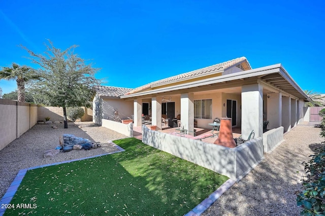 rear view of house with a patio area