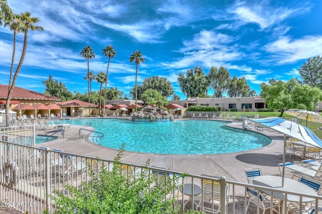 view of swimming pool with a patio