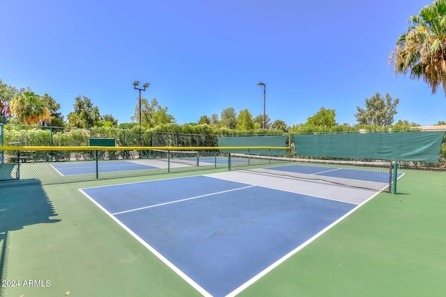 view of tennis court with basketball court