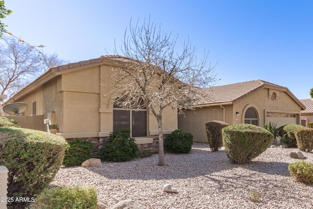 view of front of property featuring a garage