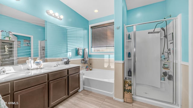11742 W Chase Ln, Avondale, AZ 85323 - full bath featuring a stall shower, a garden tub, and double vanity