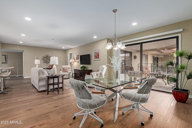 10330 W Thunderbird Blvd Unit A301, Sun City, AZ 85351 - dining area featuring recessed lighting, light wood-style flooring, baseboards, and a chandelier