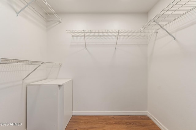 10330 W Thunderbird Blvd Unit A301, Sun City, AZ 85351 - walk in closet featuring wood finished floors