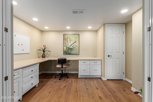 10330 W Thunderbird Blvd Unit A301, Sun City, AZ 85351 - office featuring built in desk, light wood-type flooring, baseboards, and recessed lighting