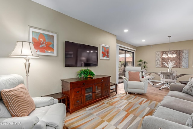 10330 W Thunderbird Blvd Unit A301, Sun City, AZ 85351 - living area featuring a chandelier, recessed lighting, light wood-type flooring, and baseboards