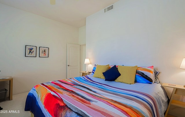 bedroom featuring carpet flooring, visible vents, and a ceiling fan