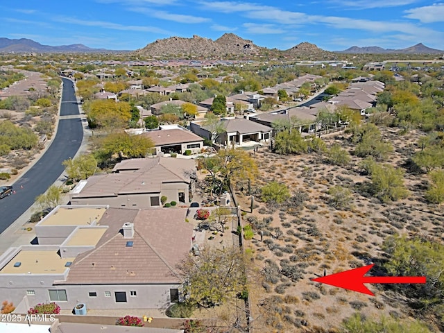 aerial view with a residential view and a mountain view