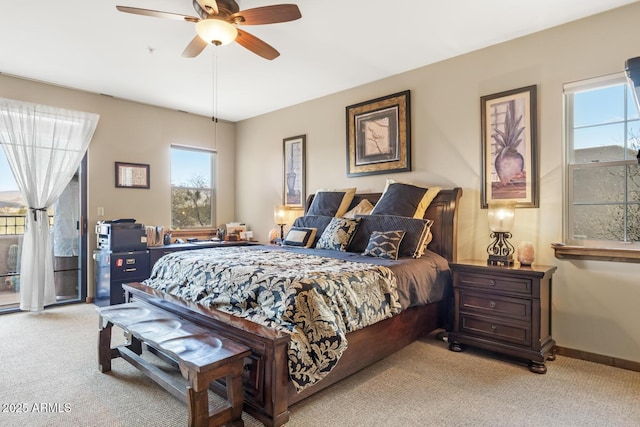 bedroom with access to outside, a ceiling fan, baseboards, and light carpet